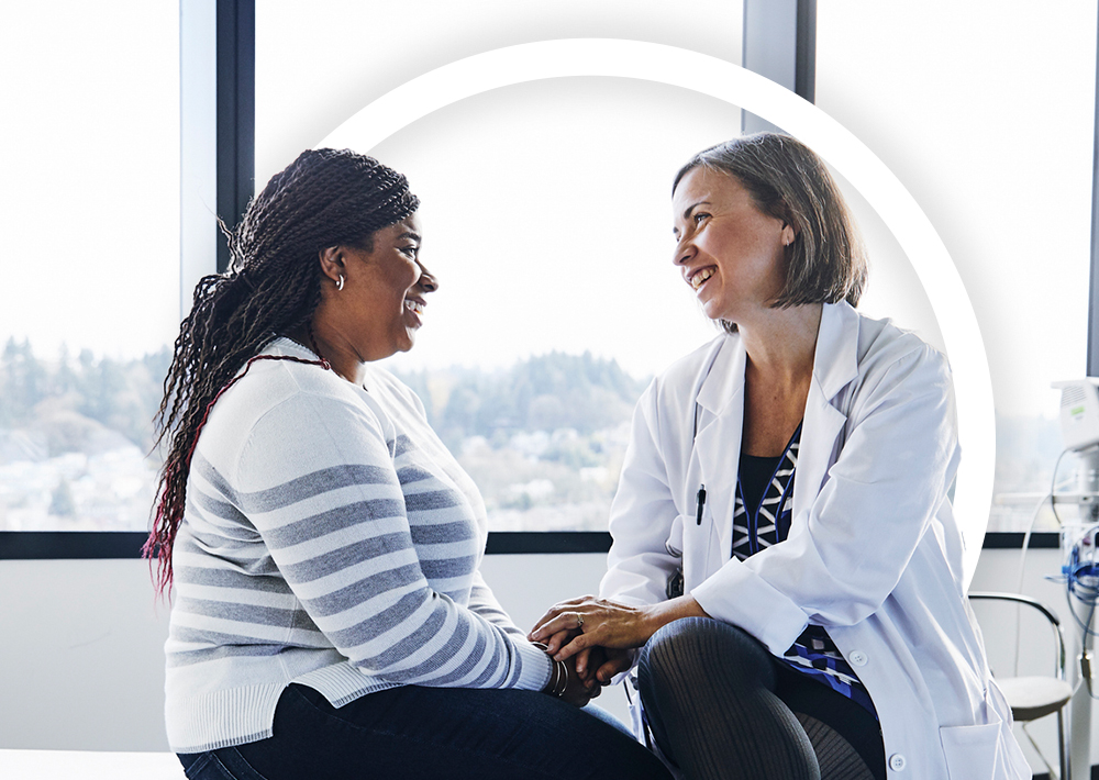 Doctor and patient talking in the exam room