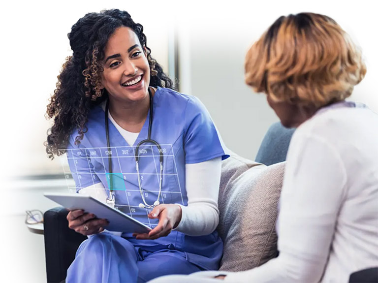 Doctor talking to patient with chart