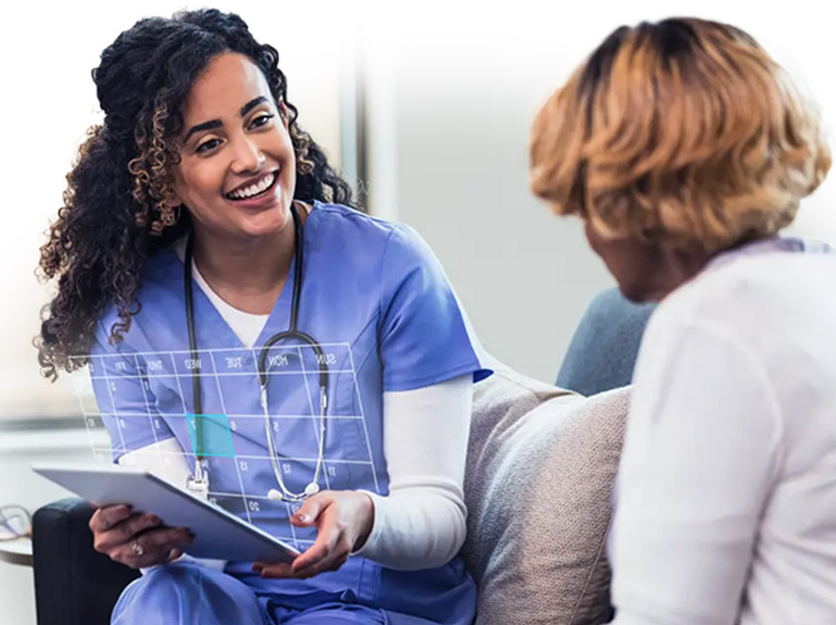 Doctor talking to patient with chart
