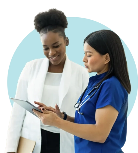 providerConnect_banner Doctor and nurse talking and looking at chart